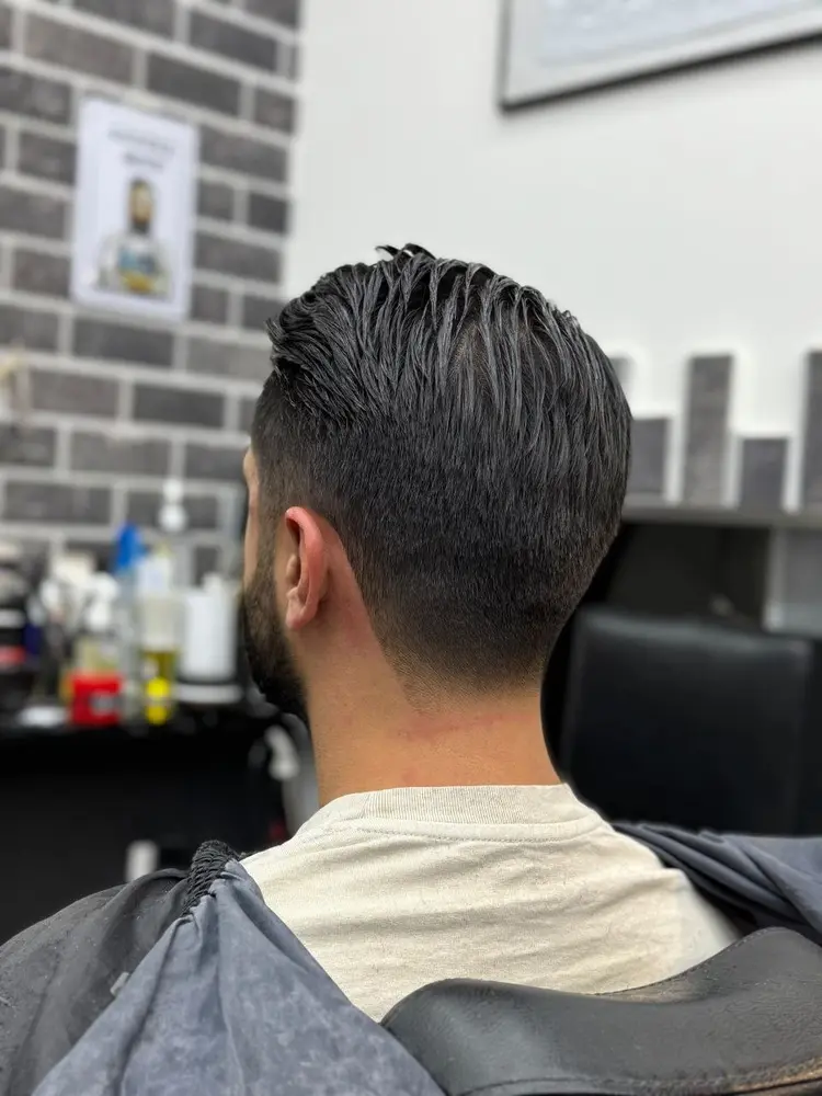 Herenkapsel van achteren bij Barbier Achie
